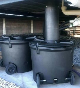 CMHP compost toilet installed under house